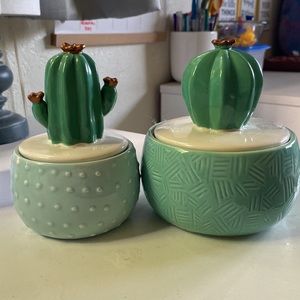 White and green cactus with gold accents, ceramic containers